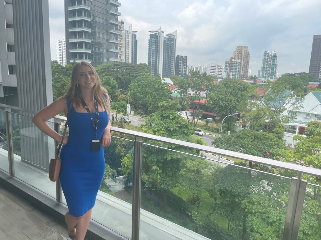 Laura Garton on a balcony in Singapore